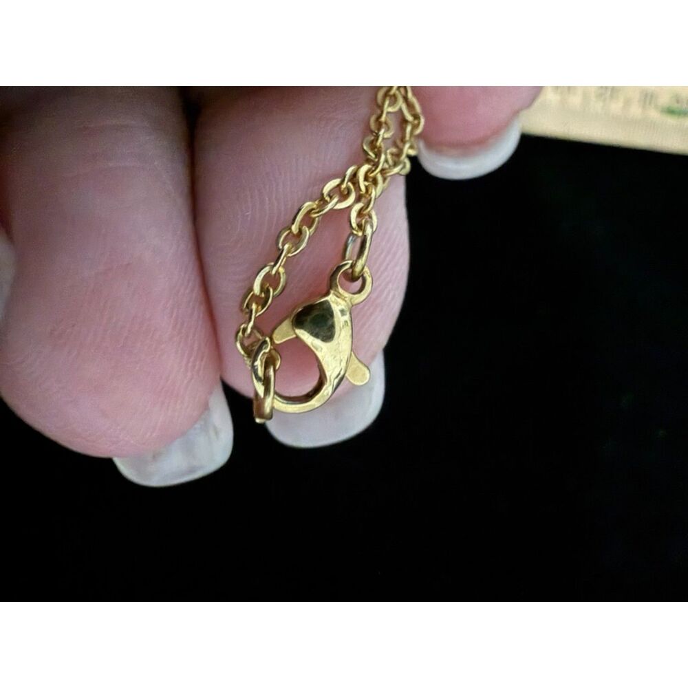 Channel symbol over mother of pearl inlay pendant on gold toned chain - Picture 9 of 10